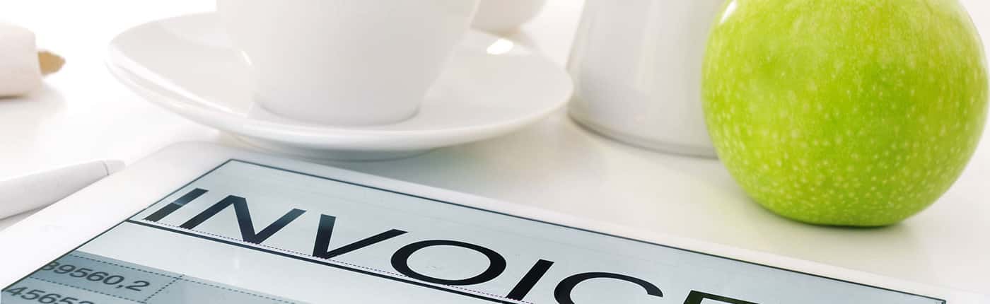 Image of an Invoice on a breakfast table