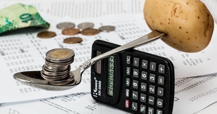 image of calculator balancing items, Secure Business Finance